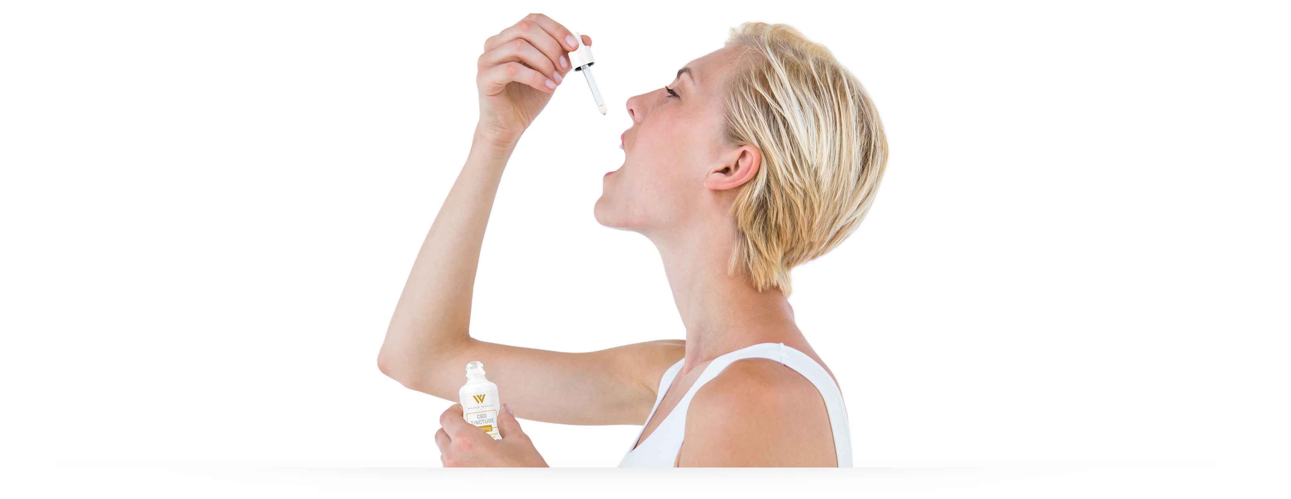 image of woman using tincture